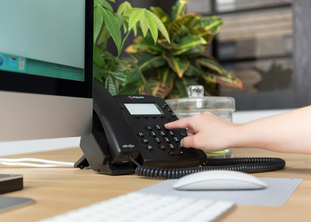 desk phone mockup with solswitch connect software for business phone provided by agilis networks a telecommunications provider